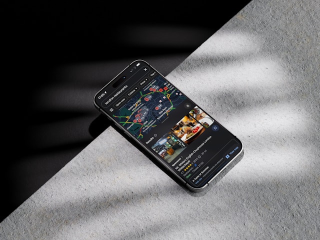 iPhone on table with google maps open