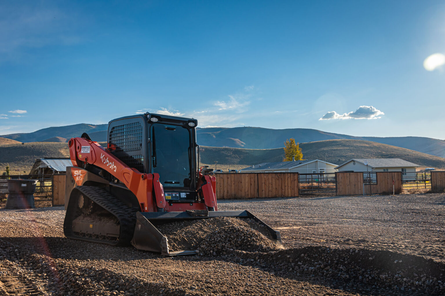 Contractor filming a short form video of framing work on a smartphone at a Utah job site for social media